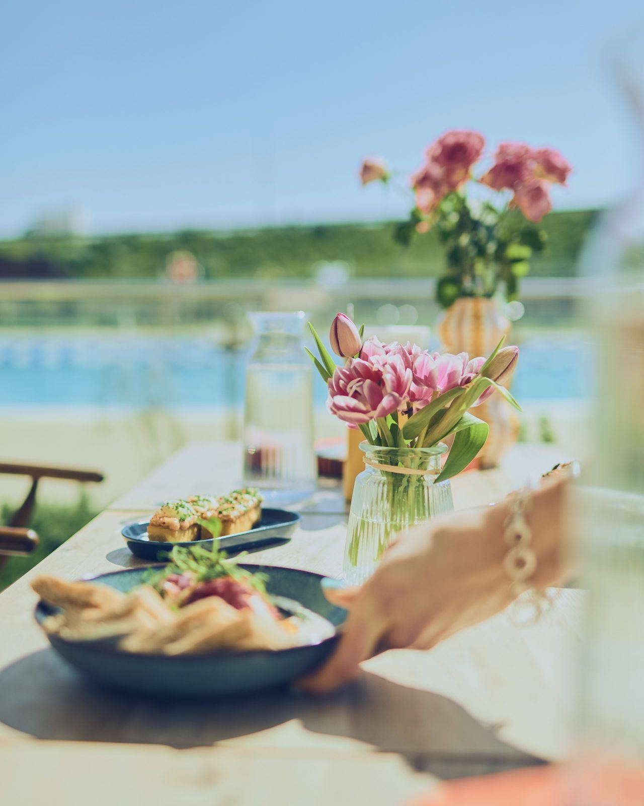 Fresh flowers daily, a slow lunch, the lido just over there